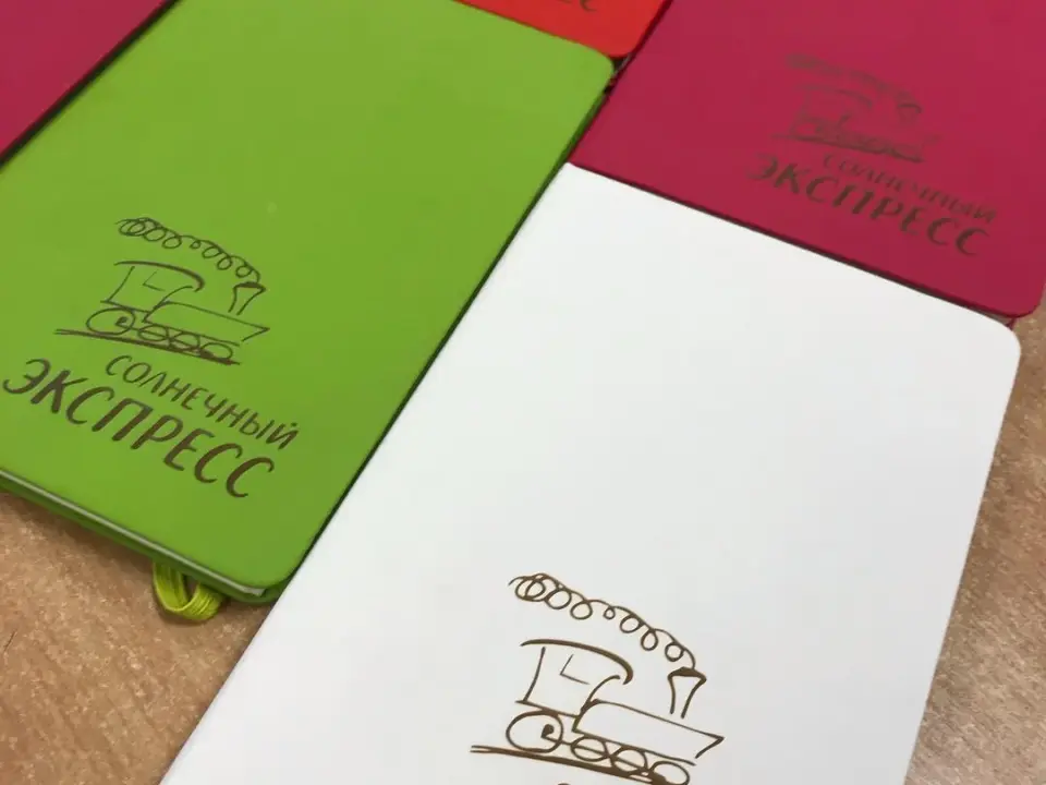 Сувенирная продукция Гравировка блокнота — печать на заказ в Томске